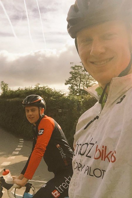 Profile selfie of Ieuan with a friend out on their bikes